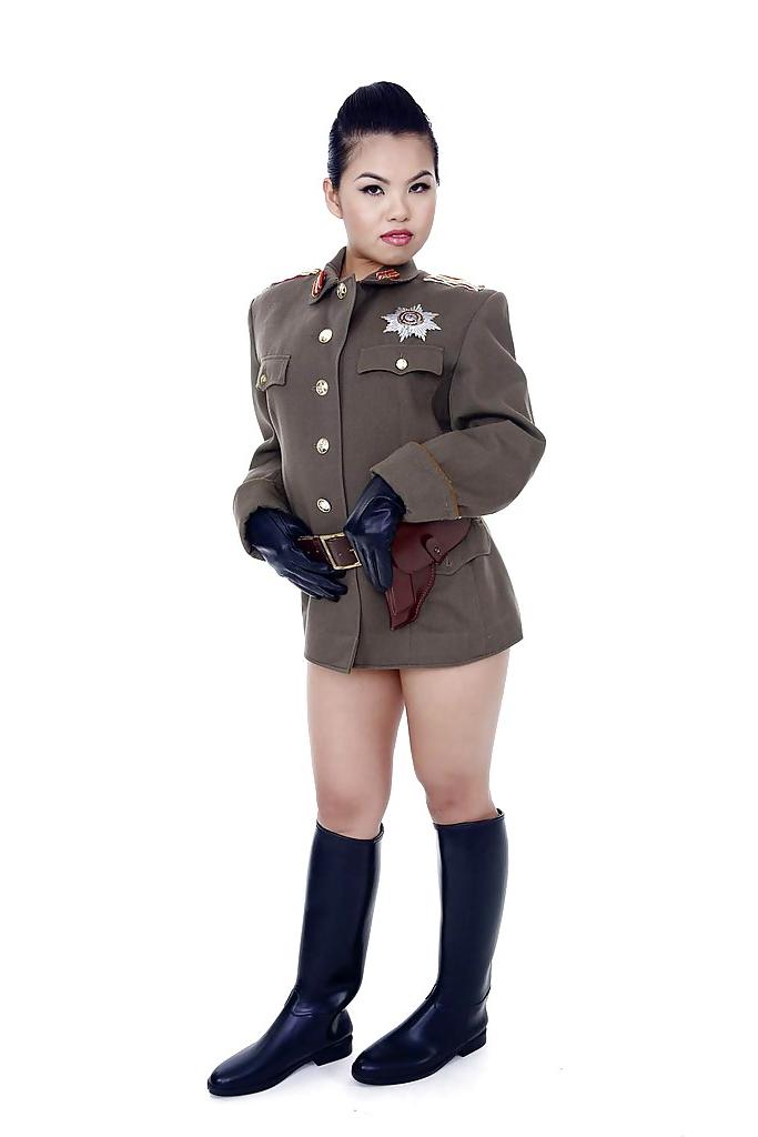 16P Oriental pornstar Cindy Starfall posing solo in military garb