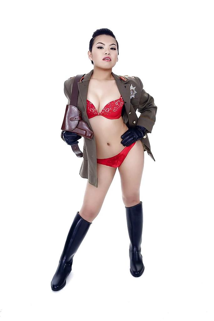 16P Oriental pornstar Cindy Starfall posing solo in military garb