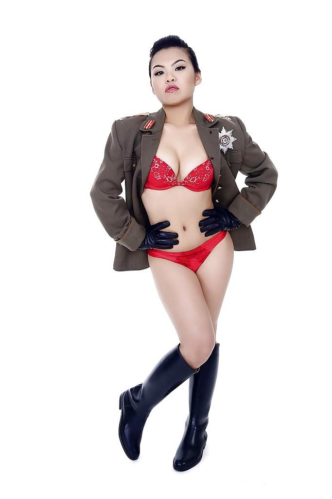 16P Oriental pornstar Cindy Starfall posing solo in military garb