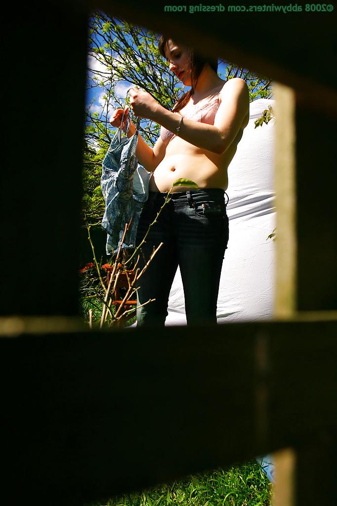 16P Hidden voyeur spies on naked girl getting dressed outdoors