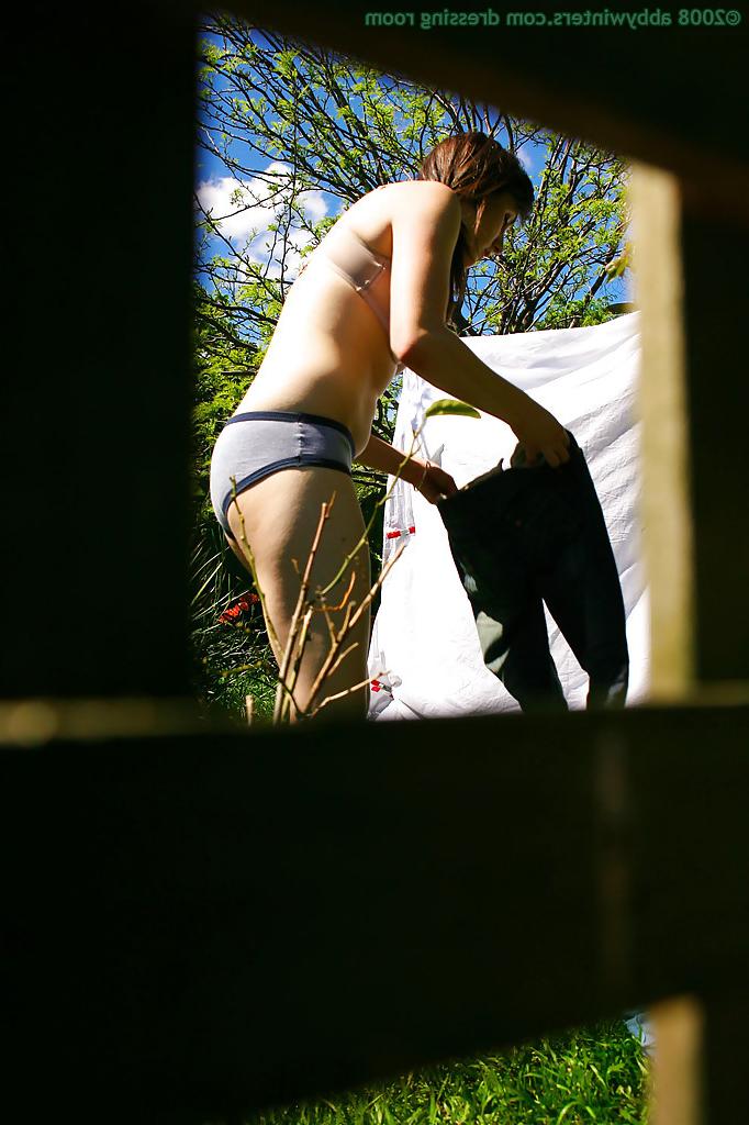16P Hidden voyeur spies on naked girl getting dressed outdoors