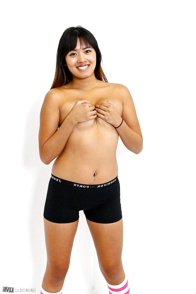 16P Dark haired Asian beauty Angelica Chung is undressing on camera
