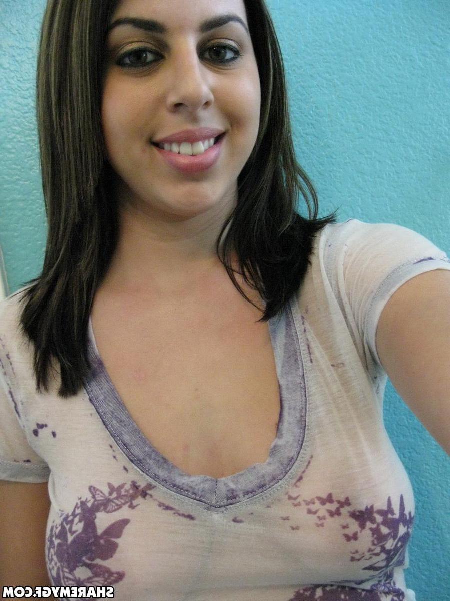 20P Busty brunette beauty takes selfies in the bathroom