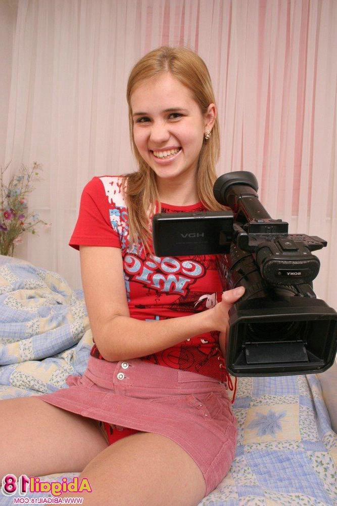 15P Two hot teens videotape each other naked