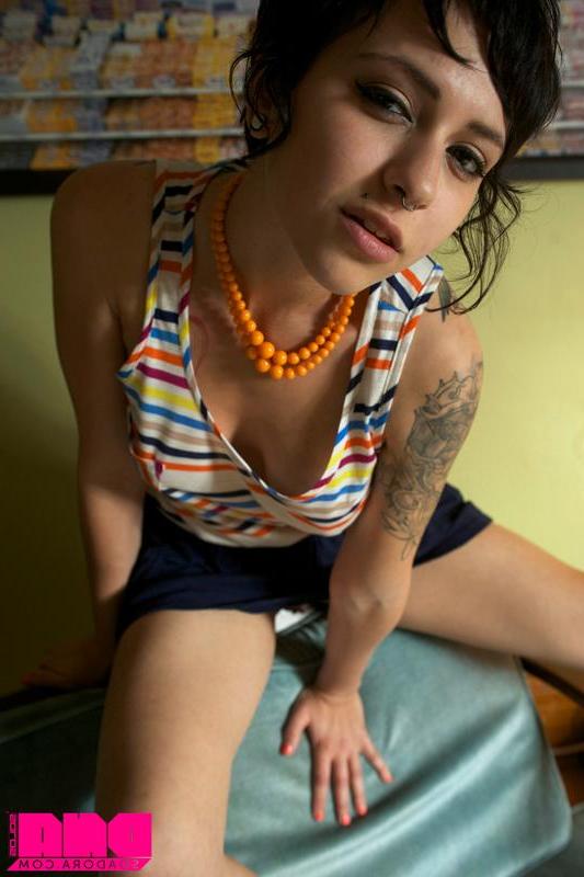 15P Brunette model Adora teases for you in her panties and socks