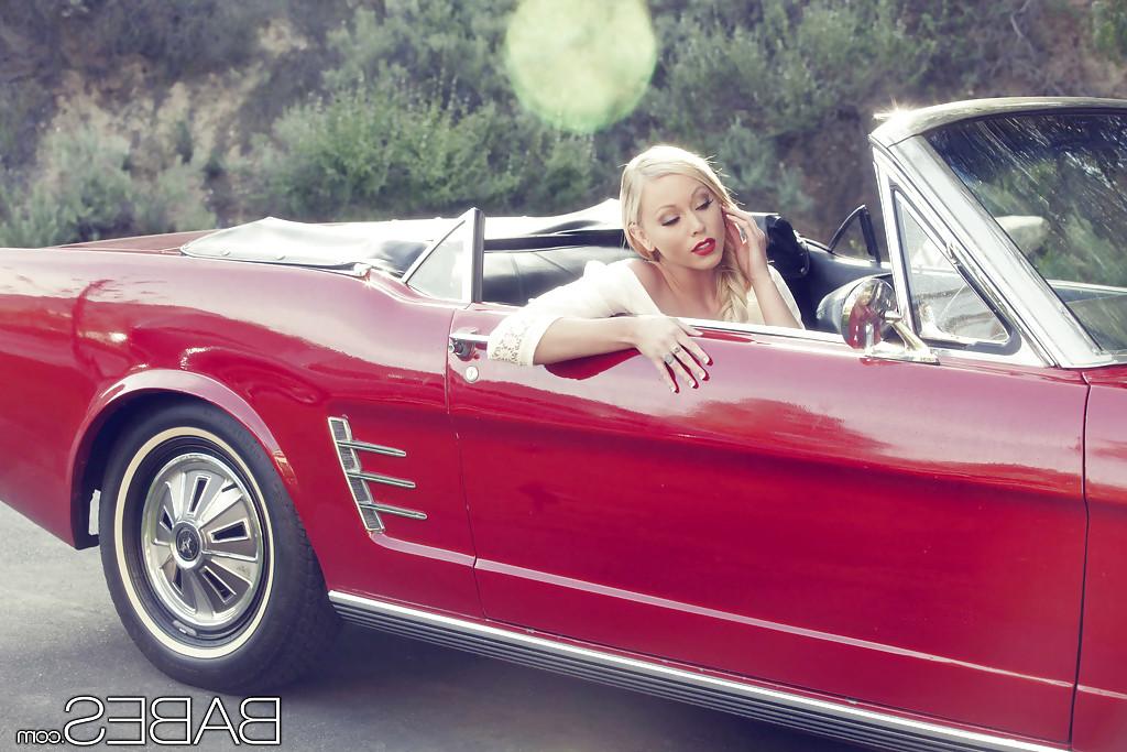 16P Glamorous blonde with red lips pleasing her tight pussy with her fingers