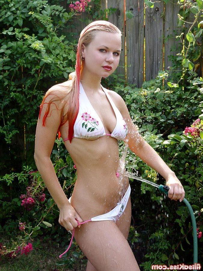 16P Pictures of teen model Alisa Kiss getting wet for you