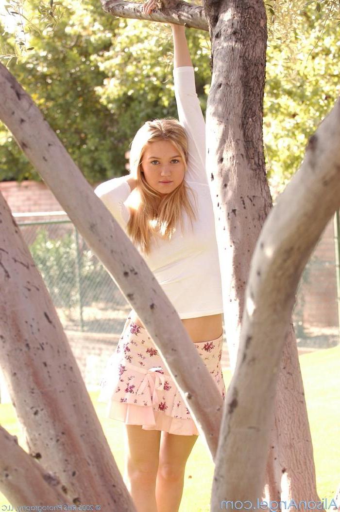 12P Pics of teen model Alison Angel getting naked outside
