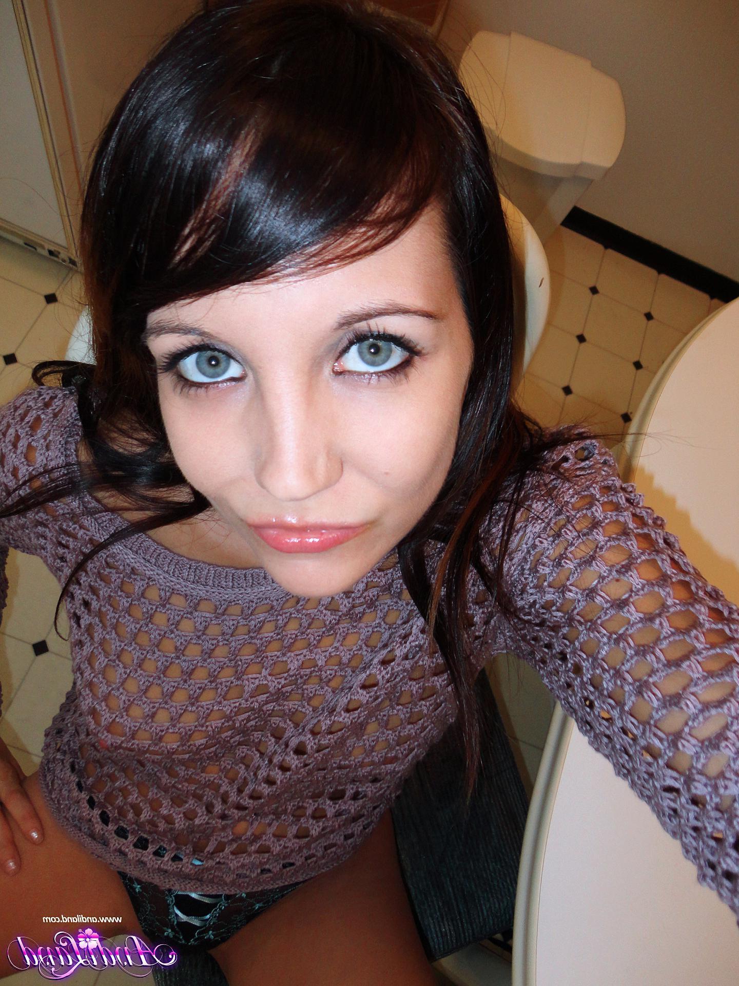 15P Pictures of Andi Land taking some hot pics of herself in jeans and a knit top