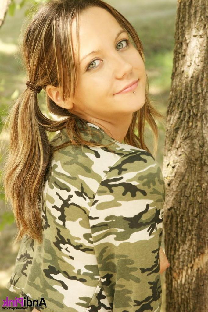 15P Andi Pink dressed up in camo outside