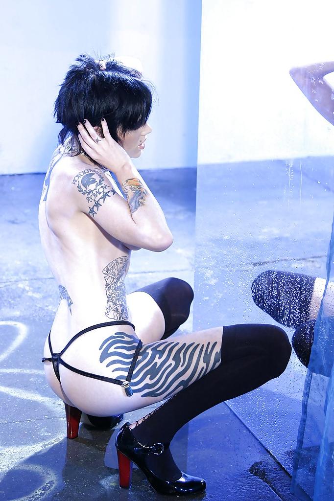 16P Short-haired brunette Cadence St John uncovering her graceful tattooed curves