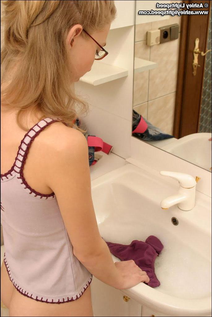 20P Pictures of a college coed in the bathroom