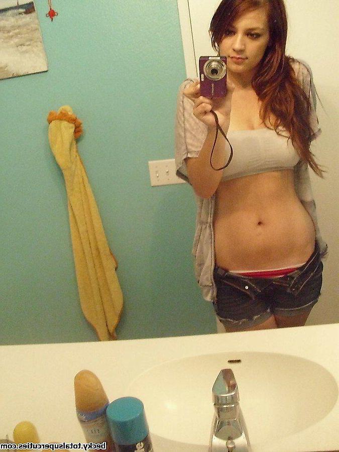 20P Pictures of Becky taking hot pics of herself in the bathroom