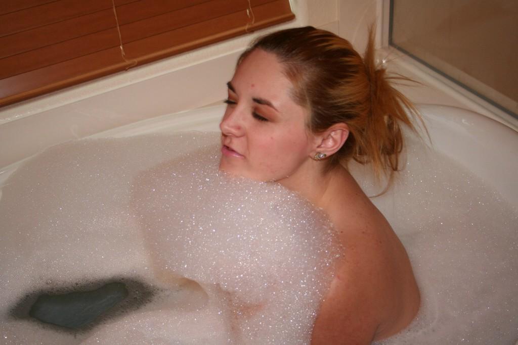 13P Pictures of Busty Barbi getting all wet for you