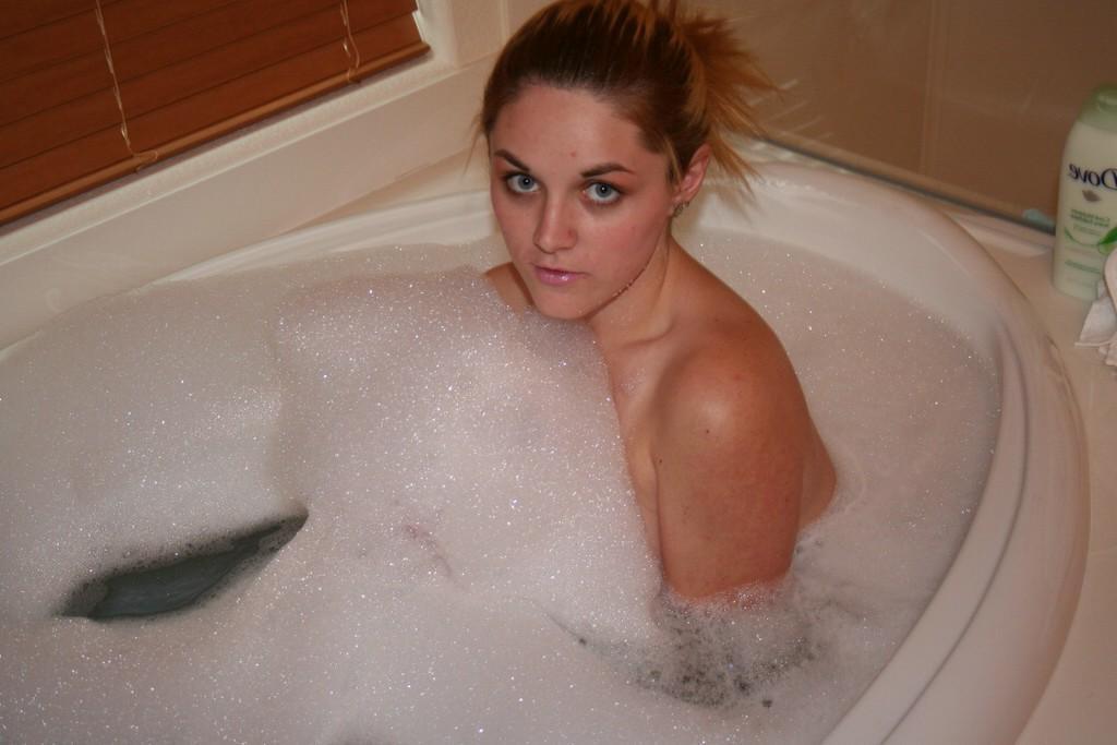 13P Pictures of Busty Barbi getting all wet for you
