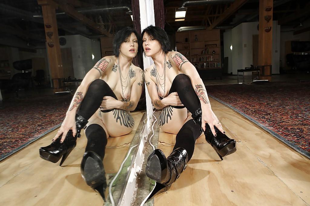 16P Tattooed brunette in black stockings posing in front of the large mirror