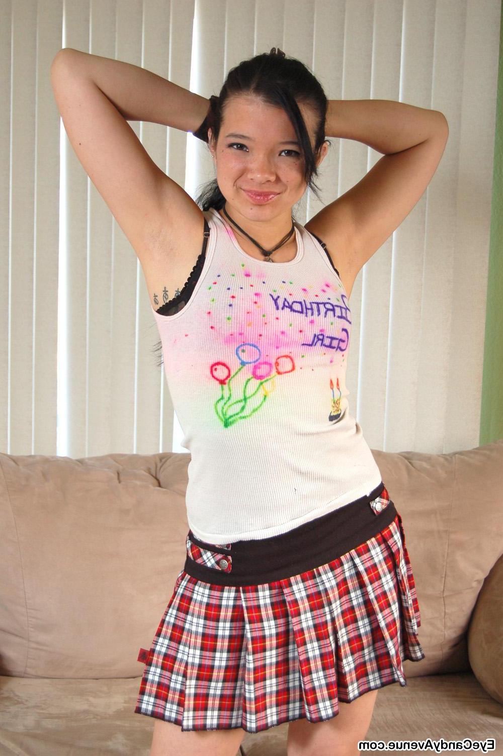 16P Brunette girl Charli strips out of her plaid skirt
