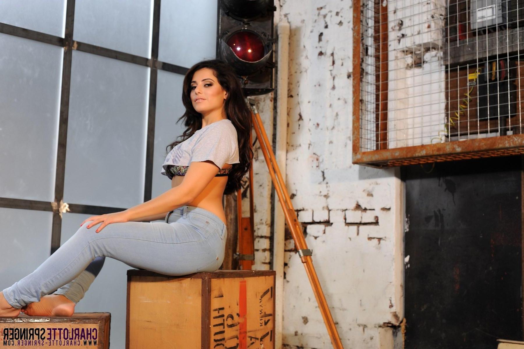 16P Charlotte Springer shows off her natural boobs in a pair of jeans