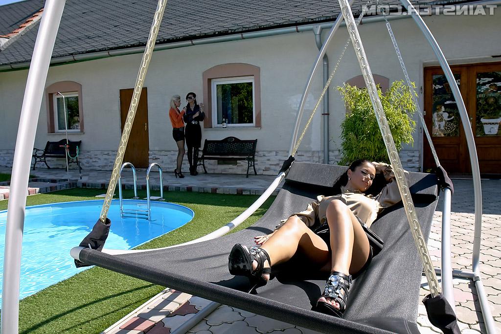 16P Nessa Devil is into fully clothed lesbian threesome by the pool