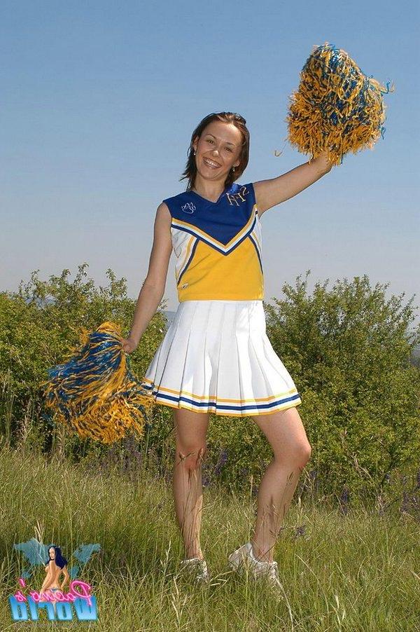 15P Pictures of a cheerleader toying her tight pussy outside
