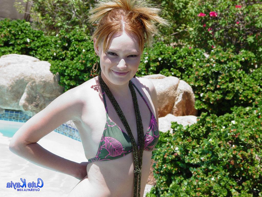 20P Cute Kayla strips off her bikini outside