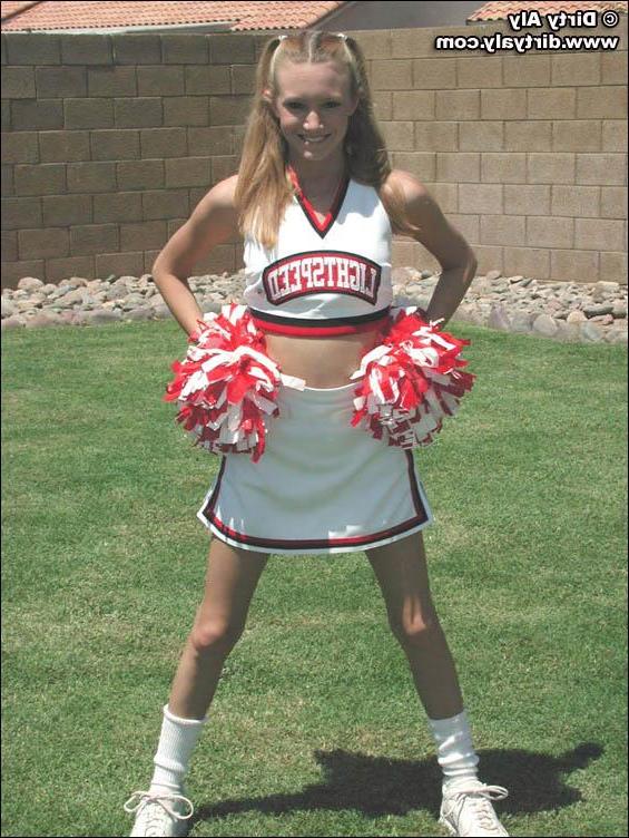 20P Pictures of cheerleader Dirty Aly getting naked in the back yard