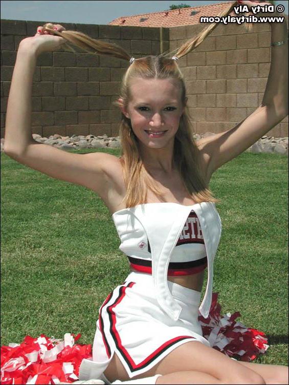 20P Pictures of cheerleader Dirty Aly getting naked in the back yard
