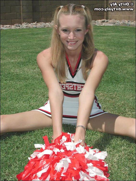 20P Pictures of cheerleader Dirty Aly getting naked in the back yard