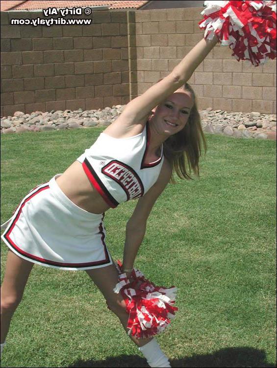 20P Pictures of cheerleader Dirty Aly getting naked in the back yard