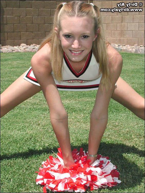 20P Pictures of cheerleader Dirty Aly getting naked in the back yard