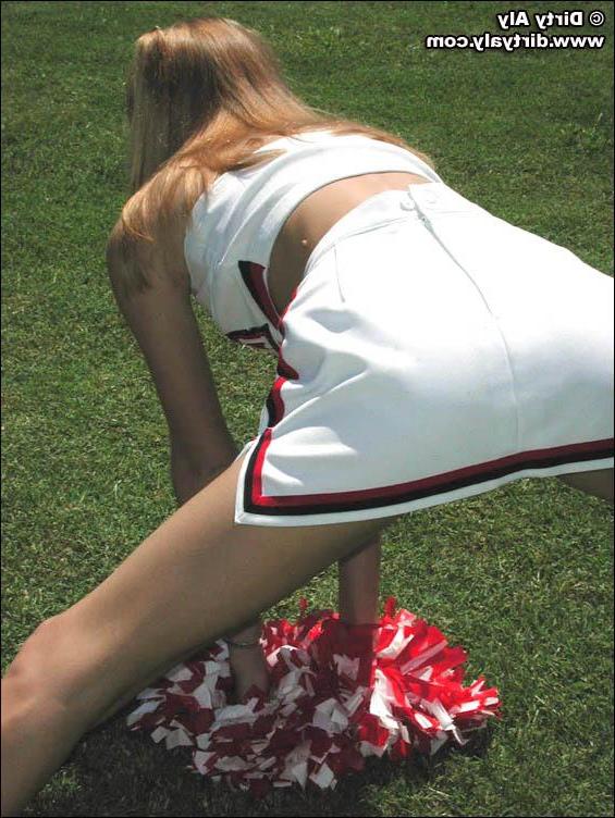 20P Pictures of cheerleader Dirty Aly getting naked in the back yard
