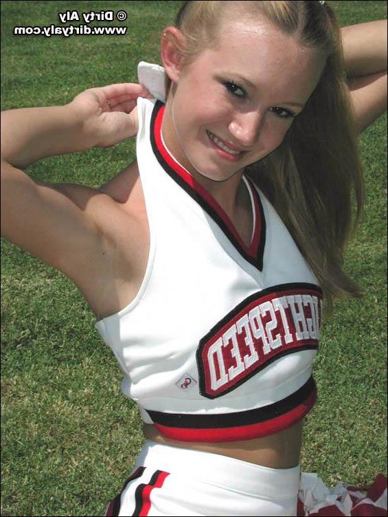 20P Pictures of cheerleader Dirty Aly getting naked in the back yard