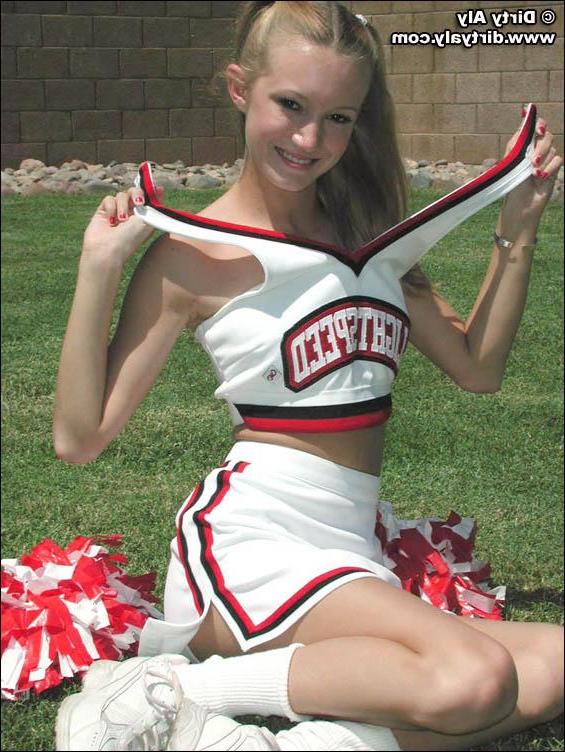 20P Pictures of cheerleader Dirty Aly getting naked in the back yard