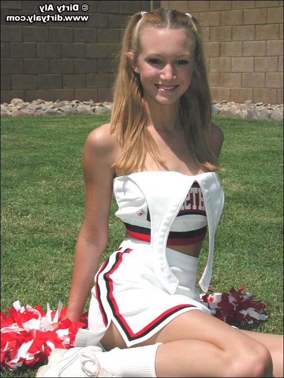 20P Pictures of cheerleader Dirty Aly getting naked in the back yard