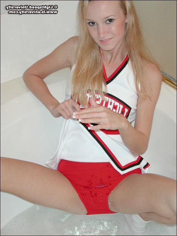 20P Pictures of Lightspeed University cheerleader Dirty Aly getting herself all wet
