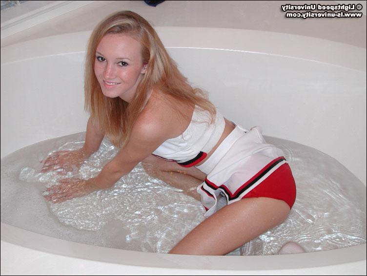 20P Pictures of Lightspeed University cheerleader Dirty Aly getting herself all wet