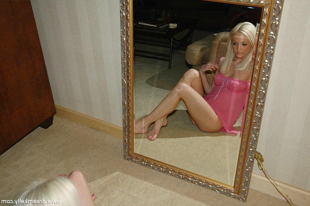 16P Dream Kelly admires herself in front of the mirror