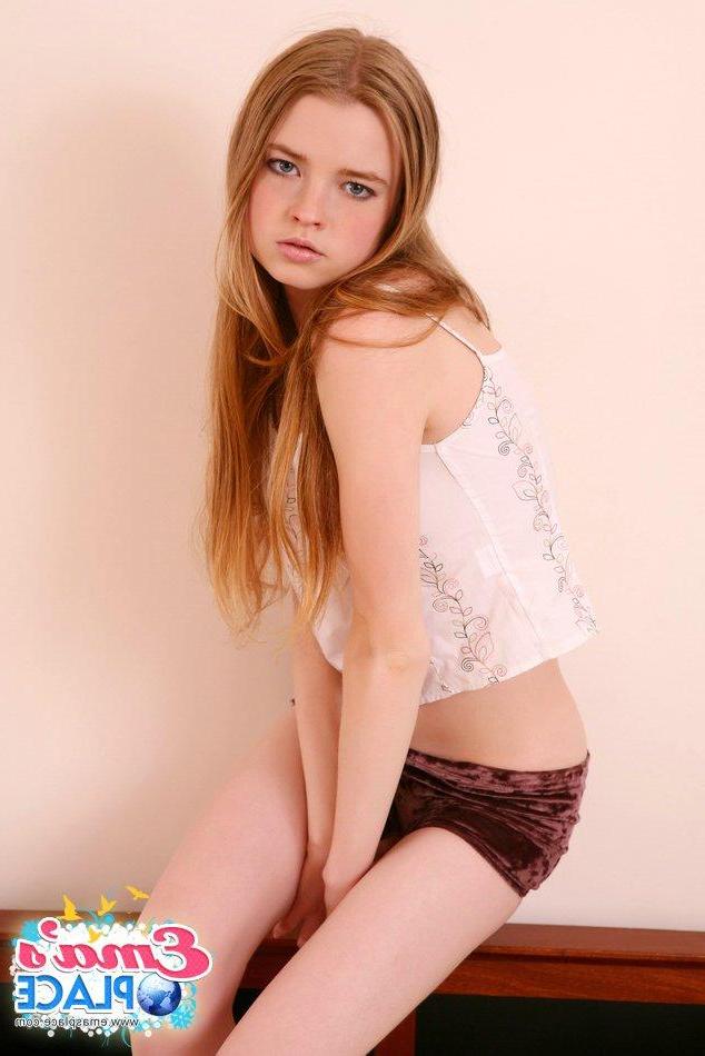 15P Pictures of teen model Ema's Place exposing her tits