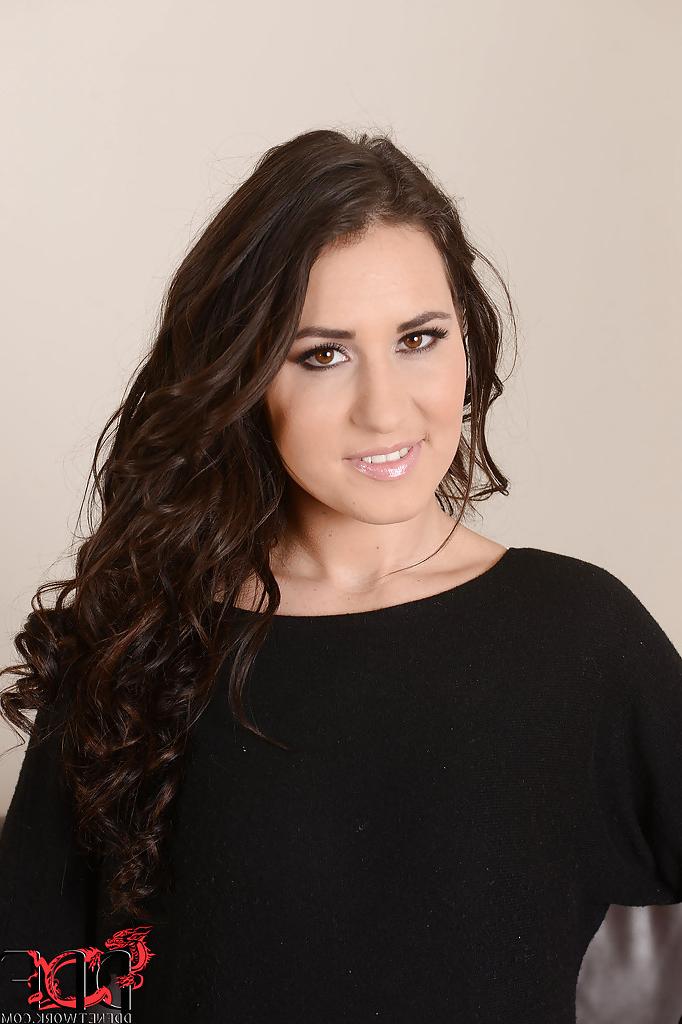 16P Curly, dark-haired babe shows the most precious parts of her body