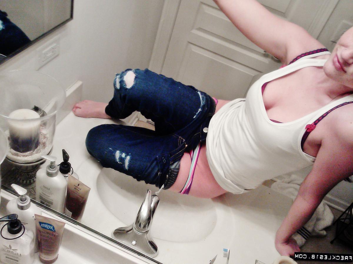 11P Pictures of Freckles 18 taking sexy pics of herself in the bathroom