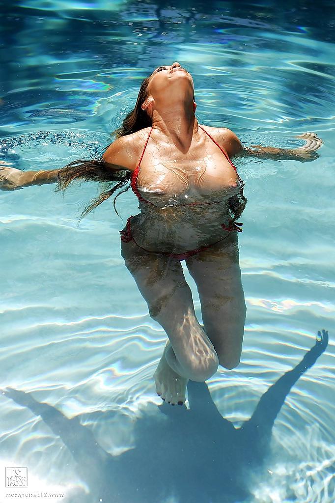 16P Bosomy latina Kayla Carrera slipping off her tiny bikini by the pool