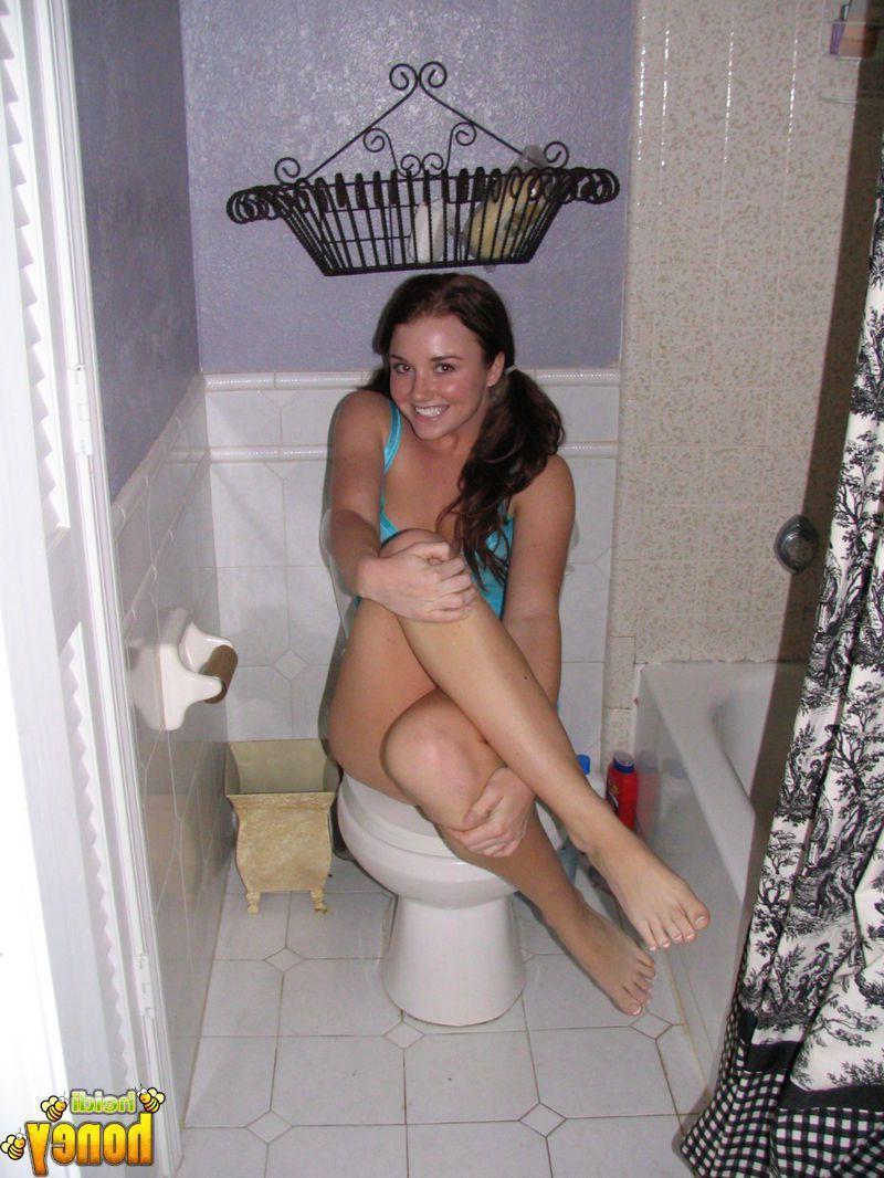 20P Pictures of teen cutie Heidi getting naughty in the bathroom