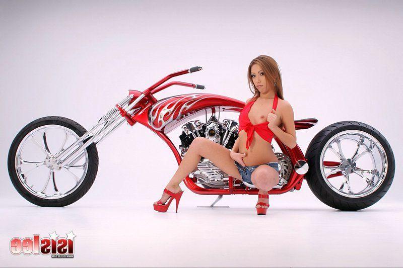 20P Pictures of teen model Isis Lee showing off with a motorcycle