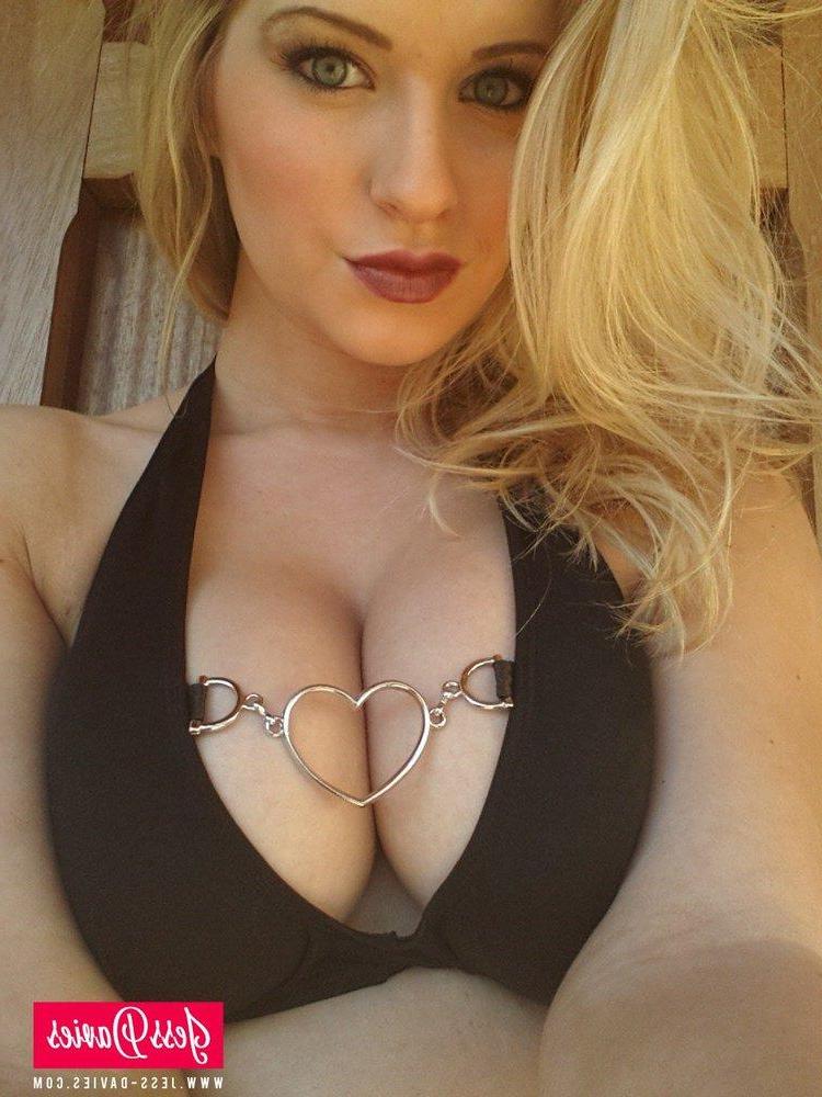 12P Jess Davies removes her bikini top to show you her big tits