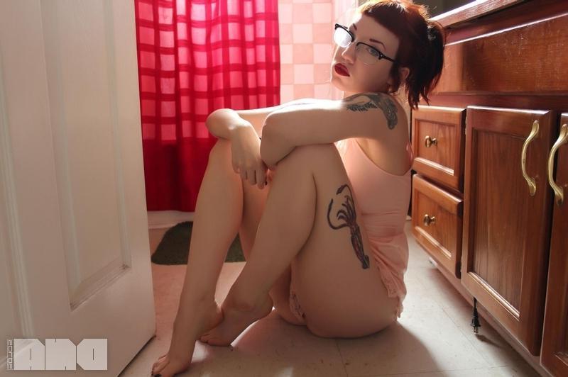 15P Pretty alt girl Jesse Caits wears only her glasses in the bathroom