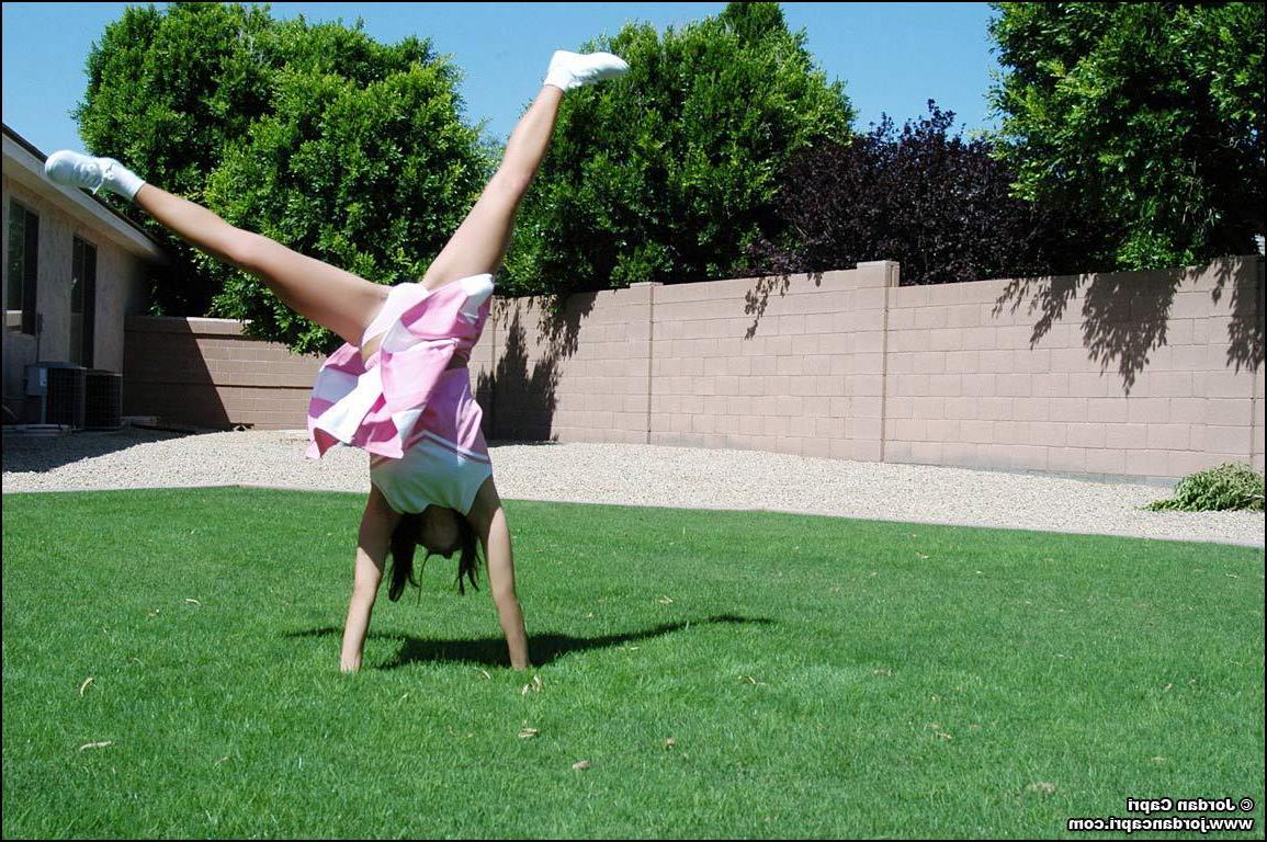 20P Pictures of teen hottie Jordan Capri doing a cheer outside