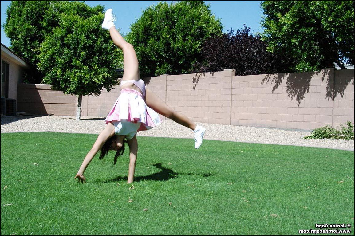 20P Pictures of teen hottie Jordan Capri doing a cheer outside