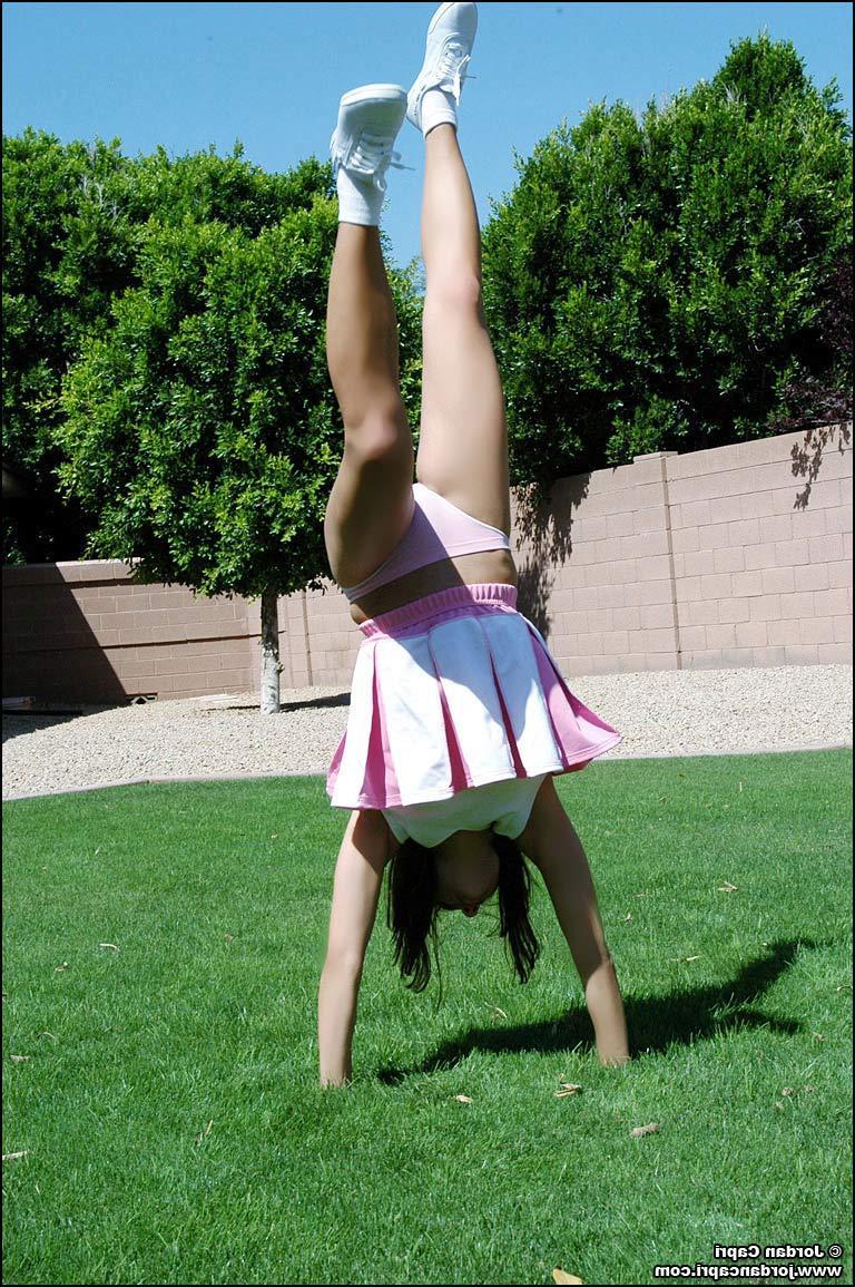 20P Pictures of teen hottie Jordan Capri doing a cheer outside