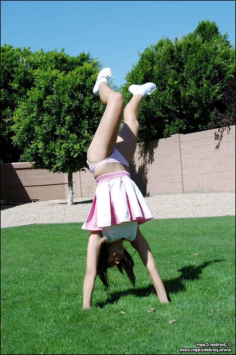 20P Pictures of teen hottie Jordan Capri doing a cheer outside