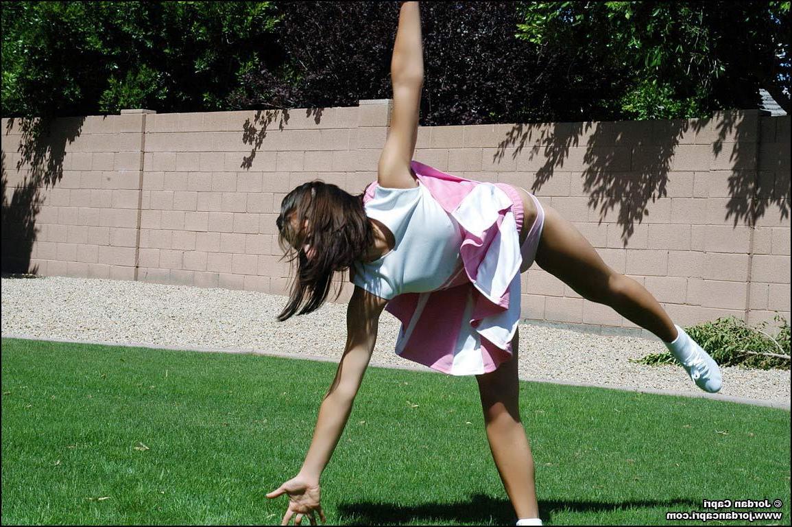 20P Pictures of teen hottie Jordan Capri doing a cheer outside